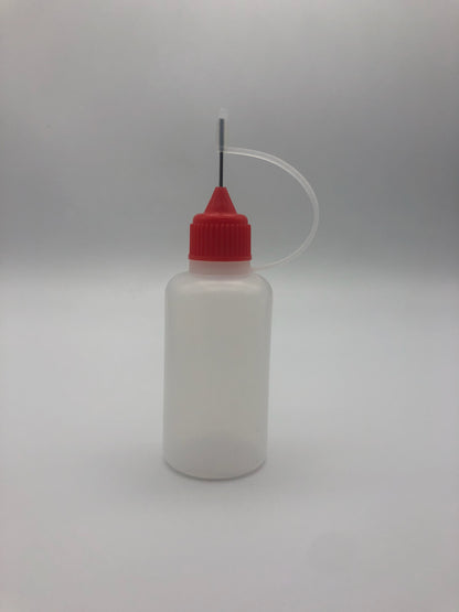 Bottle with Needle Spout Cap